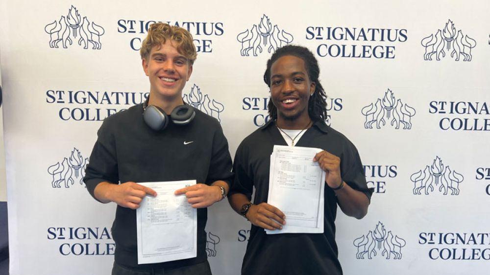 Nelson and Luke from St Ignatius College School showing their results