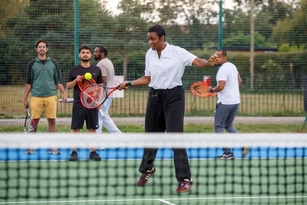 Cllr Anyanwu playing tennis