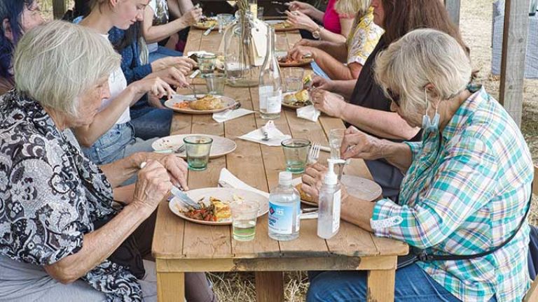 Members of the North London Ukrainian Hub at lunch at the vineyard. Photo credit: Derek Grant 