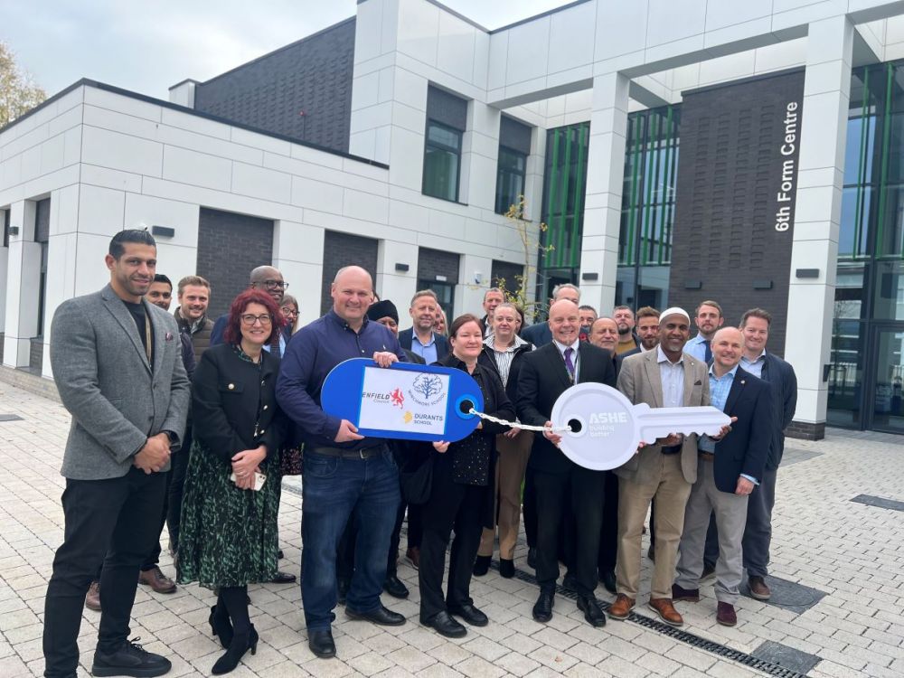 A group photo outside Winchmore School of staff and partners