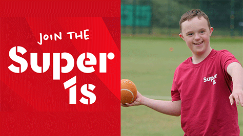 Boy in Super 1s t-shirt about to throw a ball